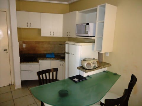 Standard Apartment | Private kitchen | Full-size fridge, microwave, stovetop, cookware/dishes/utensils