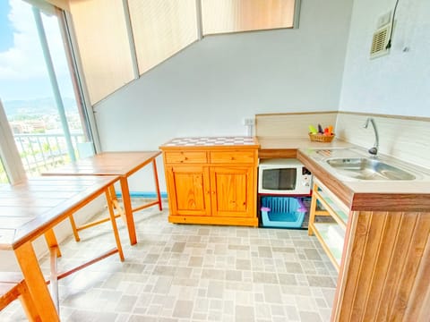 Junior Apartment, 2 Bedrooms, Ocean View | Private kitchen | Fridge, electric kettle, freezer, dining tables