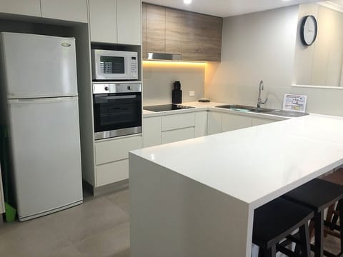 Two Bedroom Apartment with Terrace | Private kitchen | Full-size fridge, microwave, stovetop, dishwasher