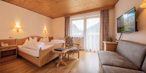 Standard Triple Room, Balcony, Mountain View | Free WiFi, bed sheets