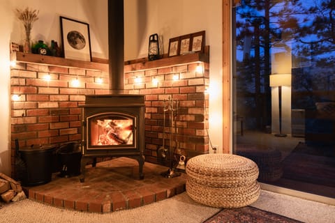 Cozy up by the warm wood burning fireplace at Scout's Hideaway! - Cozy up by the warm wood burning fireplace at Scout's Hideaway!