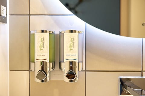 Shower, eco-friendly toiletries, hair dryer, towels