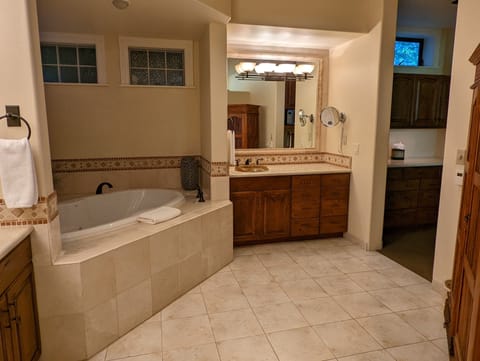 The Creekside Suite | Bathroom | Jetted tub, free toiletries, hair dryer, towels