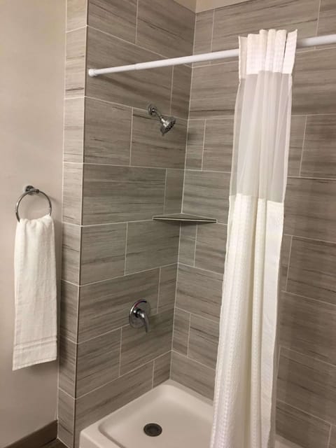 Suite, 1 King Bed, Non Smoking, Refrigerator & Microwave | Bathroom | Combined shower/tub, rainfall showerhead, free toiletries, hair dryer