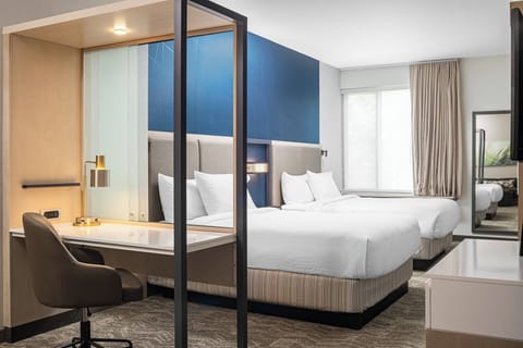 Desk, laptop workspace, iron/ironing board, free cribs/infant beds