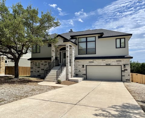 Double lane driveway with room for your vehicles, boat/jet skis and golf cart.
