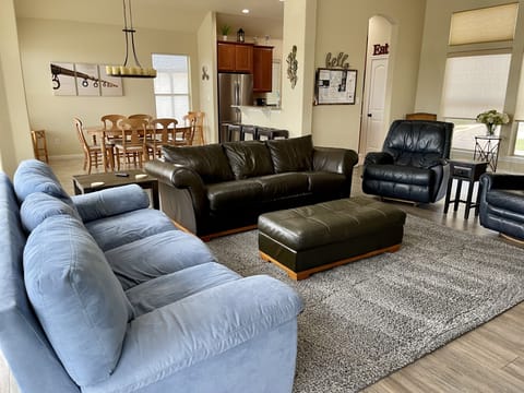 Living & dining room, message board and kitchen view. Spacious 2100 Sq Ft home.