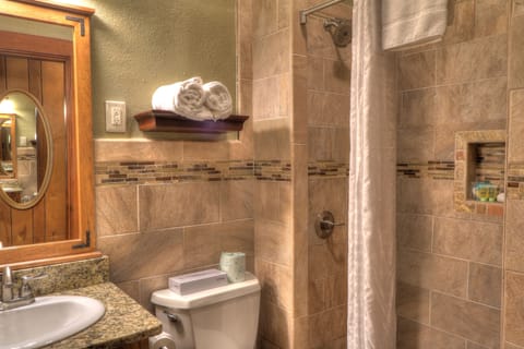 Standard Room, 1 King Bed | Bathroom | Combined shower/tub, deep soaking tub, free toiletries, towels