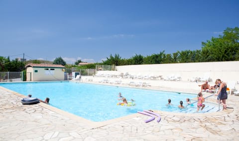 Outdoor pool, open 10:00 AM to 8:00 PM, sun loungers