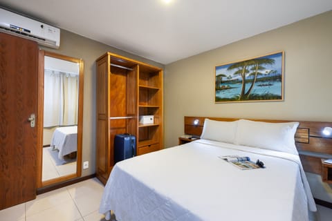 Family Room | Minibar, in-room safe, free WiFi, bed sheets