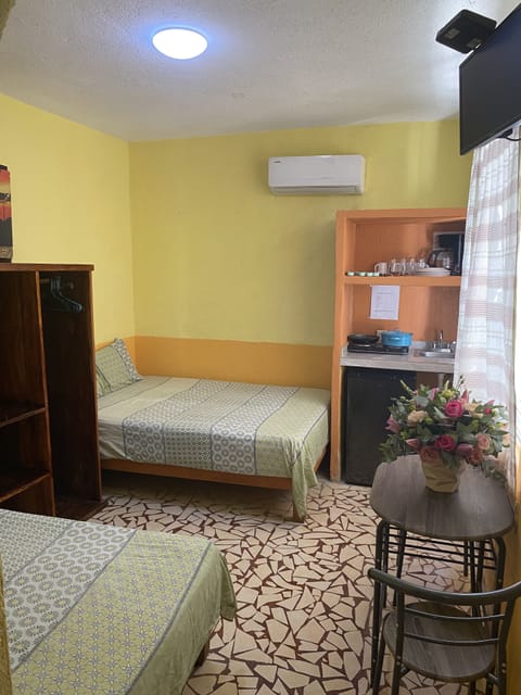 Studio, 2 Double Beds | In-room safe, blackout drapes, iron/ironing board, free WiFi