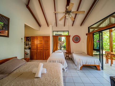 Deluxe Villa, Kitchen, Garden View | Down comforters, in-room safe, desk, free WiFi