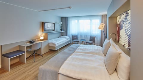 Family Room | Premium bedding, down comforters, free minibar, in-room safe