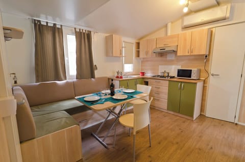 Premium Mobile Home, 3 Bedrooms | Living area | LED TV, table tennis, books