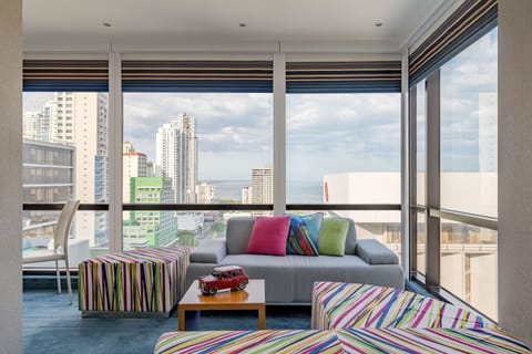 aloft, Suite, 2 Queen Beds, City View | Living room | 42-inch LED TV with digital channels, TV, pay movies