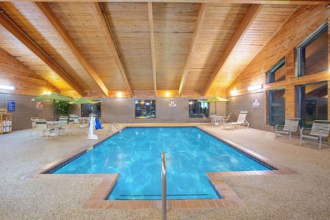 Indoor pool, open 10:00 AM to 10:00 PM, sun loungers