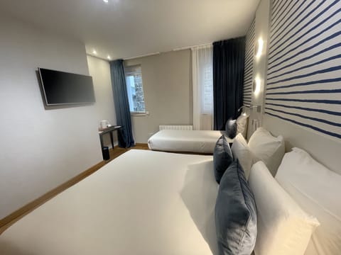 Apartment, Courtyard View (for 5, No Sea View) | Desk, blackout drapes, soundproofing, iron/ironing board