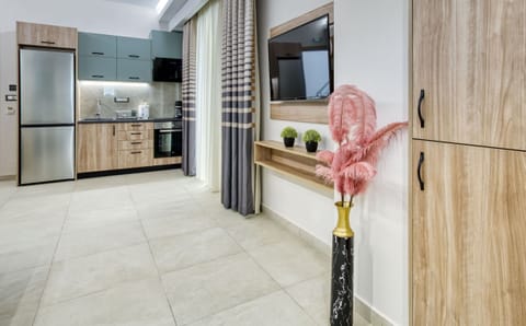 Suite, 2 Bedrooms, Partial Sea View | Private kitchen | Fridge, oven, stovetop, espresso maker