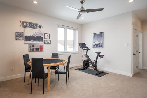 The lower level lounge has something for everyone - games, movies and even a Peloton!