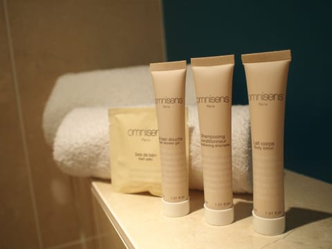 Eco-friendly toiletries, hair dryer, towels