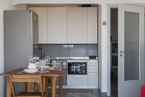 Apartment | Private kitchen | Full-size fridge, microwave, oven, dishwasher