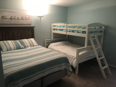 Bedroom #1 with queen bed, twin over full bunk bed and full bathroom!