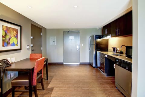 Suite, 1 King Bed, Accessible (Mobility & Hearing, Roll-in Shower) | Private kitchen | Full-size fridge, microwave, stovetop, dishwasher