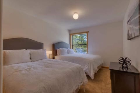 Bedroom 3 features two full beds. While bedroom 4 features two twin beds.