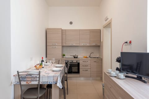 Family Apartment, 2 Bedrooms (La Suite 2 Ondina Viareggio 200m from) | Private kitchen | Fridge, oven, stovetop, coffee/tea maker