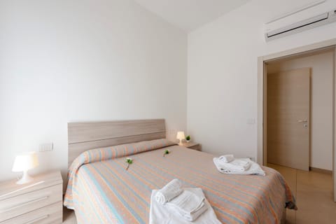 Family Apartment, 2 Bedrooms (La Suite 2 Ondina Viareggio 200m from) | 2 bedrooms, desk, free WiFi, bed sheets