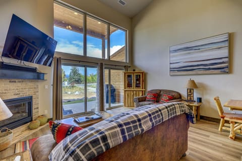 This expansive living space includes WIFI, TV, and a new sofa for kicking back and watching your favorite show or movie.