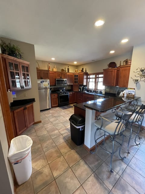 Island seats 3 and table has 8 Chairs