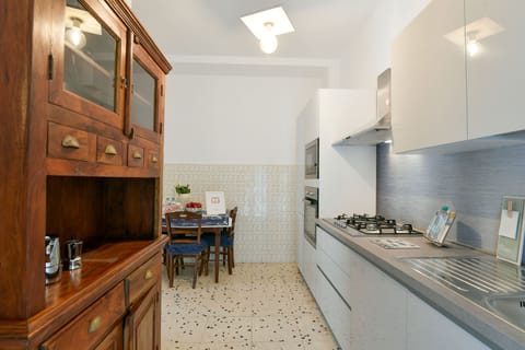 Apartment | Private kitchen | Full-size fridge, oven, dishwasher, cookware/dishes/utensils