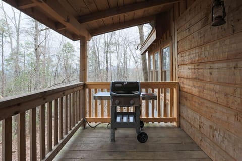 Gas grill on back porch