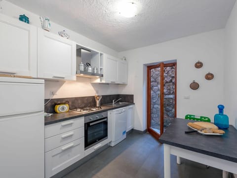 Cabinetry, Furniture, Property, Countertop, Blue, Kitchen Stove, Home Appliance, Interior Design, Building, Kitchen Appliance