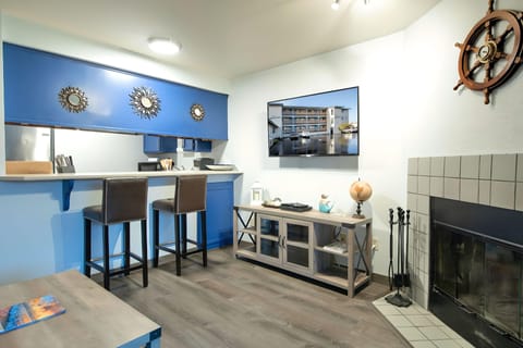 Condo | Living room | 50-inch flat-screen TV with cable channels, Smart TV, fireplace