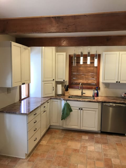 Our recently remodeled kitchen with granite countertops and a huge sink.