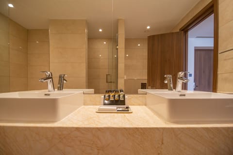 Suite, 1 Queen Bed, Club Lounge Access, City View | Bathroom | Shower, rainfall showerhead, hair dryer, bathrobes