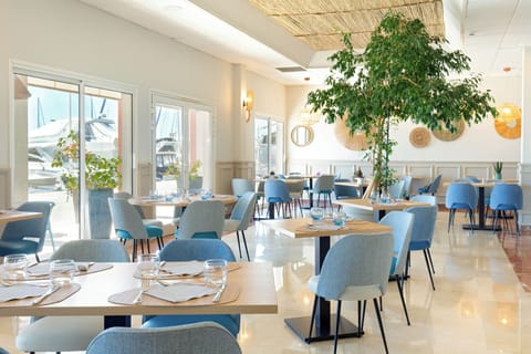 Lunch, dinner served; Mediterranean cuisine, beach views