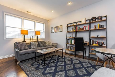 Living room with desk/library - perfect for entertaining or sitting back and enjoying a great read