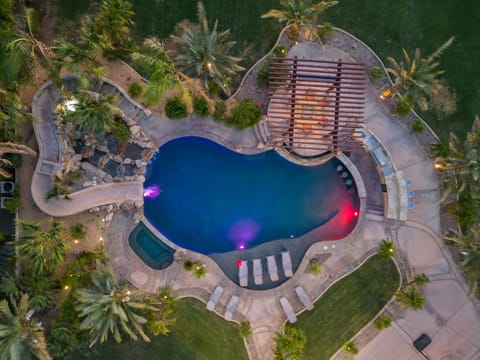 Dunes Resort Luxury Single family home featuring 3 pickle ball courts, a tennis court, full size NBA basketball court, resort size pool with waterside, swim up bar, baha ledge with interior pool ramp and so much more!