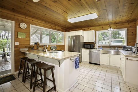 Share meals and conversations around the inviting breakfast bar.
