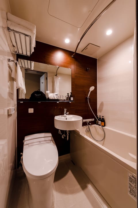 Double Bed Room, Non Smoking | Bathroom | Combined shower/tub, deep soaking tub, free toiletries, hair dryer