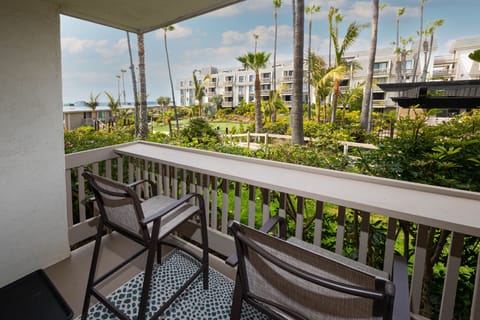 Views of the ocean, garden, and pool are yours to enjoy from your balcony.
