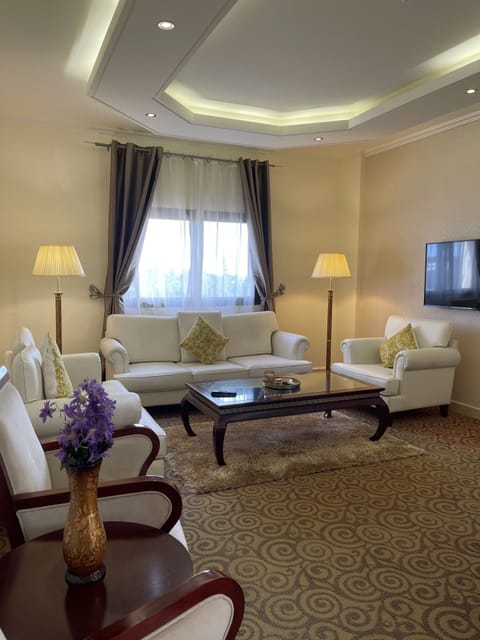 Presidential Suite | Living area | 32-inch TV with cable channels