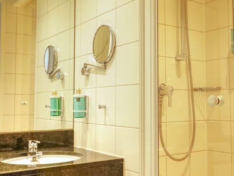 Shower, eco-friendly toiletries, hair dryer, towels