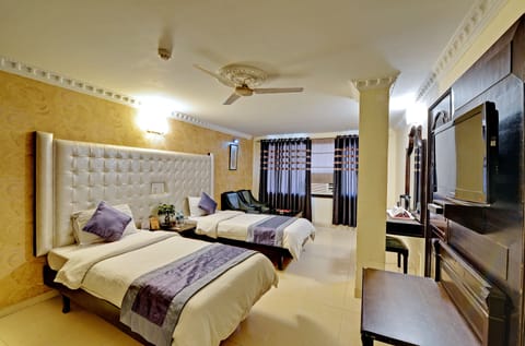 Standard Room, 1 Bedroom | Living room | LCD TV, fireplace