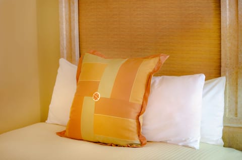 Premium bedding, down comforters, pillowtop beds, minibar