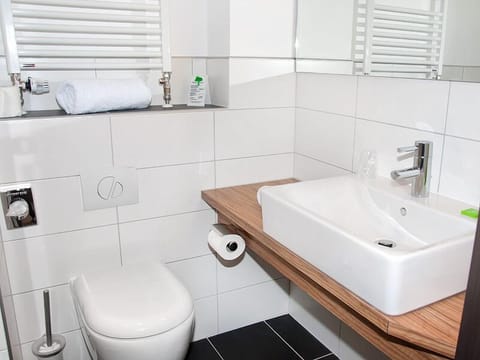 Shower, free toiletries, hair dryer, towels