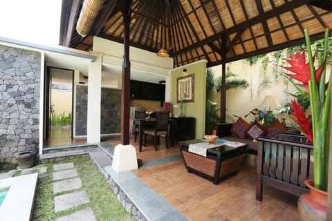 Deluxe Villa, 1 Bedroom, Private Pool, Garden Area | Living area | LCD TV